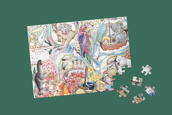 May Gibbs-inspired 100-piece magnet puzzle featuring bush friends in a whimsical Australian folklore scene.