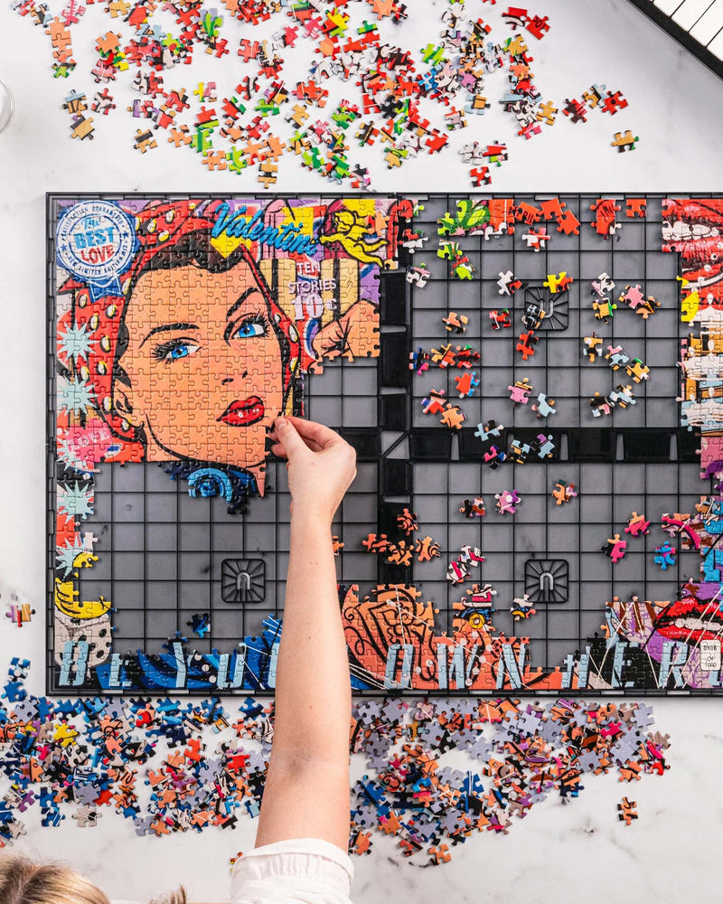 1000 piece puzzle - The Urban Pop Riveter Puzzles Drop Ship
