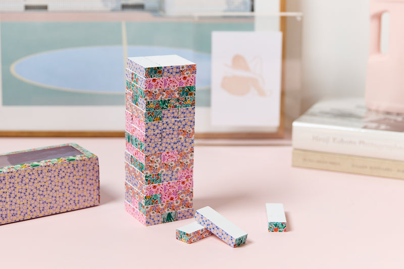Why hide your favorite game in a cupboard when you can display its beauty with our floral-printed tumbling tower set?