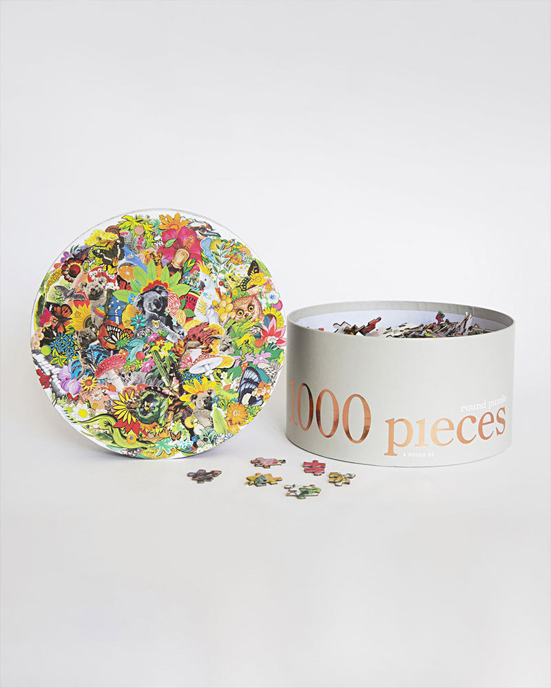 A round 1000-piece puzzle featuring the intricate Maximillian pattern with a harmonious blend of colors.