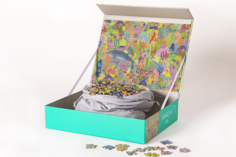 This image shows a variety of Australian-designed puzzles, created in collaboration between Journey of Something and iconic brand Kip&Co. The puzzles feature Kip&Co's signature bold and colourful prints, and are a fun and challenging way to spend a rainy day or relax with friends and family.
